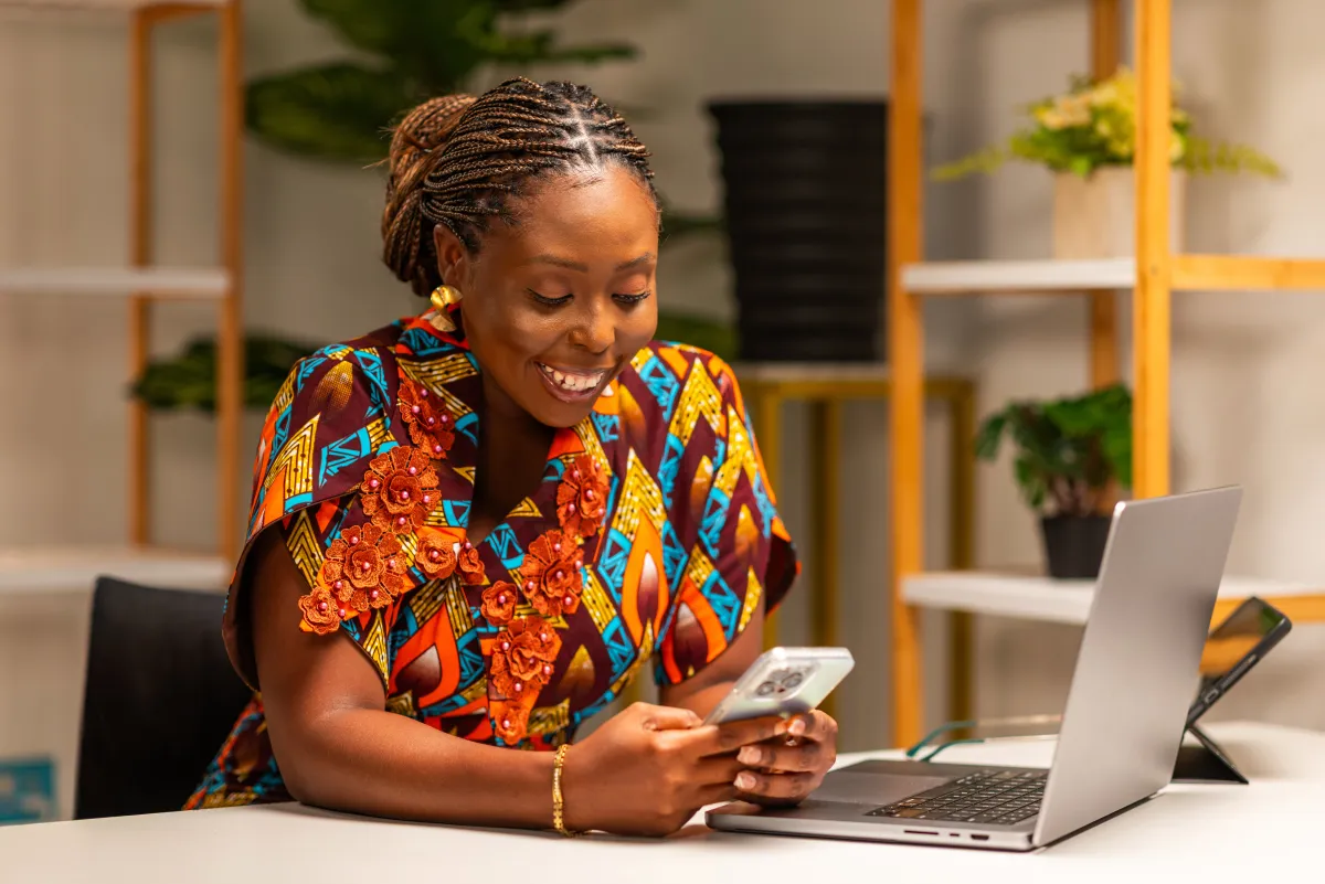 Shopkeeper managing her business with PesaScope