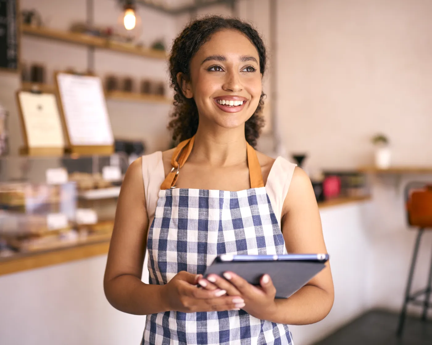 Cashier ringing up a sale at the counter